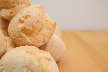 Brazilian snack food, cheese bread. Known as pao de queijo in Brazil. Close up.