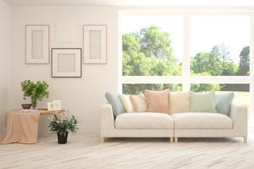 White living room with sofa and summer landscape in window. Scandinavian interior design. 3D illustration