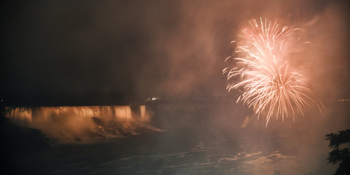 Niagara Falls Lit With Fireworks At Night
