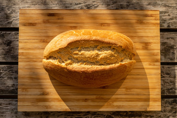 Top view of freshly baked loaf of bread