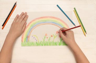 children's hands draw a rainbow, flowers, the second stage, a happy childhood, quarantined child,...