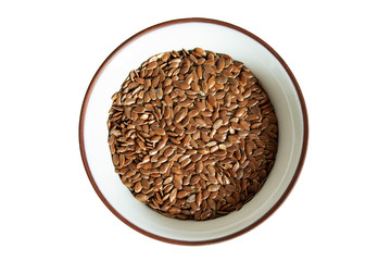 Bowl with flax seeds isolated on white background