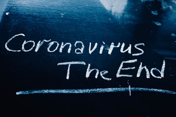 concept of ending and apocalypse from the coronavirus pandemic. chalk board