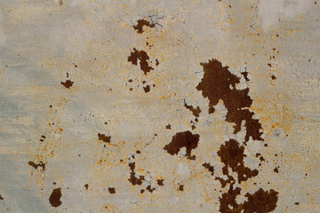 rusty corroding metal sheet with peeling paint
