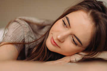 Fototapeta premium The portrait of a thoughtful woman