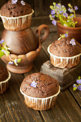 chocolate maffin and chocolate bar with blue flowers