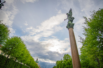 Beautiful Angel Statues at Schlosspark in Berlin at seperated sky in the sun