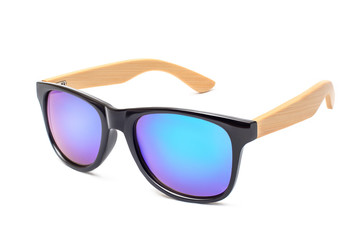 Trendy and fashionable modern sunglasses with wooden bows isolated on white background. Close-up...