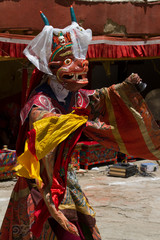 Llamas in a sacred dance in Tibet. Dance tsam.
