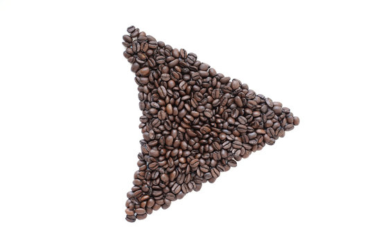 Coffee beans in the form of an arrow, on a white background.