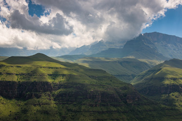 Fototapeta na wymiar Green valley in the mountains of Central Drakensberg in KwaZulu-Natal South Africa