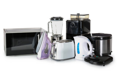 Different household appliances on white background