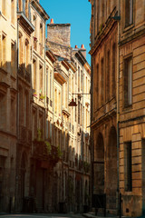 Fototapeta na wymiar Street view of old city in bordeaux, France, typical buildings from the region, part of unesco world heritage