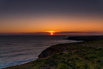 Sunset on the coast at Bedruthan, Cornwall
