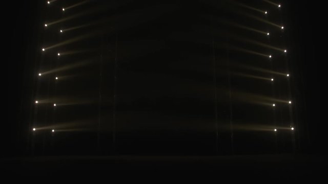 Stage with spot lighting, shining empty scene for holiday show, award Ceremony or advertising on the gold Background.