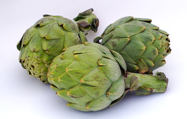 Fototapeta premium artichokes on white background healthy eating green vegetables
