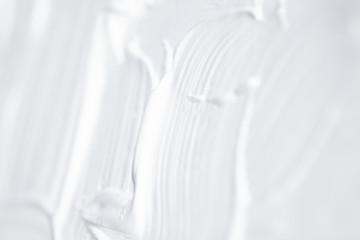Acrylic white paint close-up. Texture background