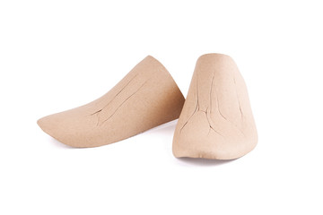 cardboard form for shoes. isolated on white color. to shape the shoes.