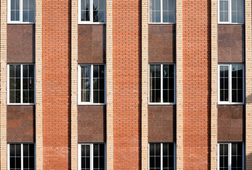 Fototapeta na wymiar shot of a high rise concrete building with a lot of windows.