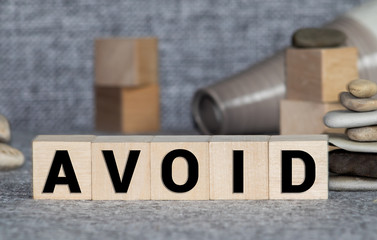 Wooden Blocks with the text: Avoid