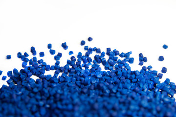 Blue plastic polymer granules isolated on white 