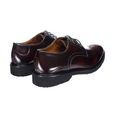 Leather classic men's shoes with laces, brown from polished leather, isolated on a white background