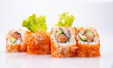 Japanese cuisine. Sushi roll on white background.