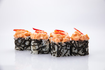 Japanese cuisine. Sushi roll on white background.
