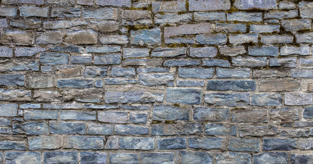 texture of old stone wall - rock bricks background