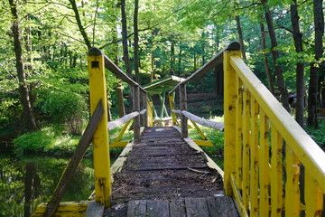 Fototapeta premium Old handmade wooden structures in a forest