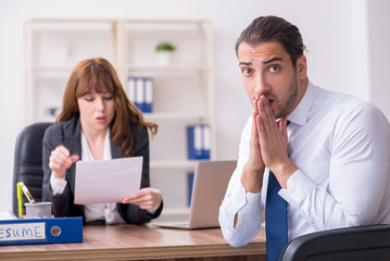 Business meeting between businessman and businesswoman