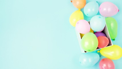 Stop motion animation with balloons getting out of gift box. Happy birthday, festive celebration, party accessories concept
