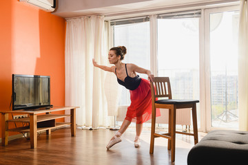 Graceful ballet dancer exercise at home isolation