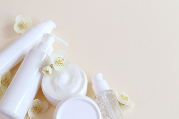 Cosmetic products for face and body in containers without labels. The concept of Spa skin care and body.