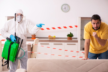 Sanitizer and young man indoors in disinfection concept