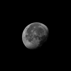 Obraz premium Waning gibbous moon phase with black background