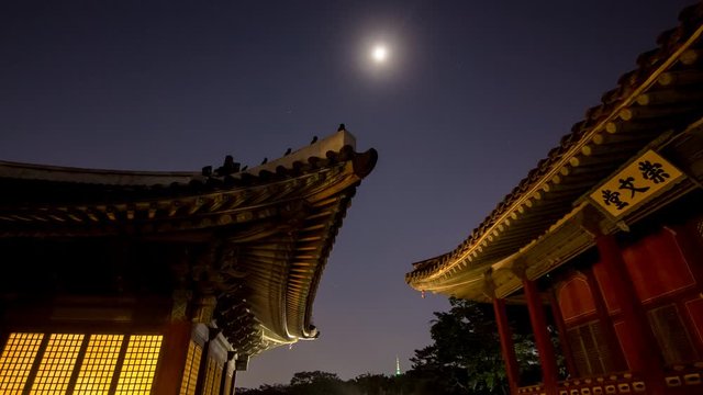 timelapse of night view with building and roof in gyeongbokgung palace (royal palace) 