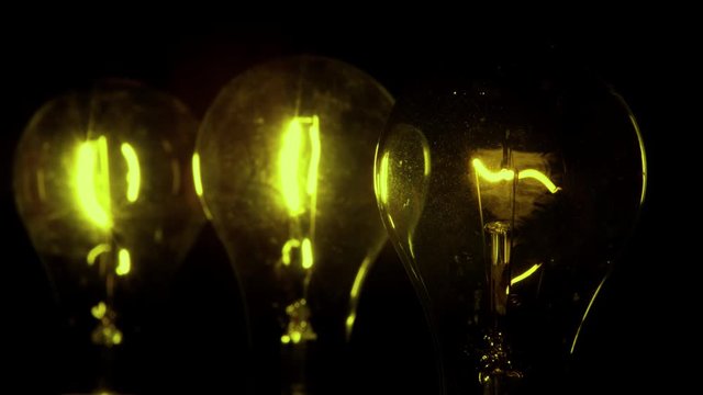 Electricity lamp . Light lamp, bulb on   black background. 4k resolution.
