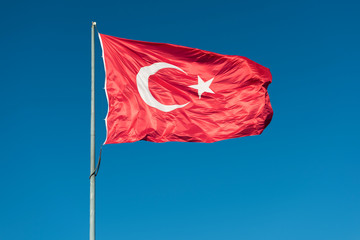 Flag of Turkey. National flag consisting of a red field (background) with a central white star and crescent. 