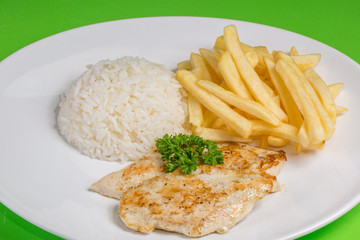 grilled chicken breast with white rice and french fries