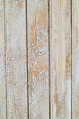 Background. Wooden boards with peeling white paint