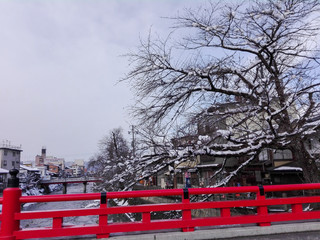 red bridge's across Miyagawa river in Takayama Town, Japan in winter