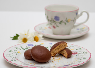 Honey bread cookie (pao de mel) typical in Brazil with china crockery