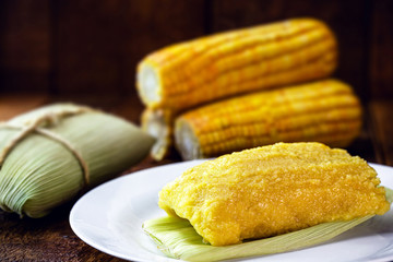 Pamonha, Brazilian sweet cheese and corn, salty or sweet, wrapped in dry straw. Dob rasil culinary...