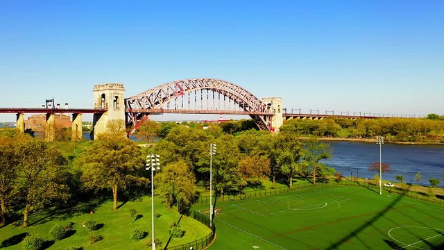 Aerial Crane Shot of the Hell Gate Bridge Over the East River