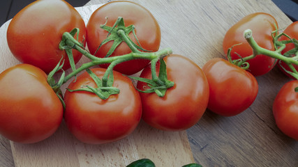 
Vegetables. Tomatoes and cucumbers with basil. Ready free entry space