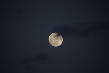 Obraz na płótnie Canvas full moon with some cloud in the night sky