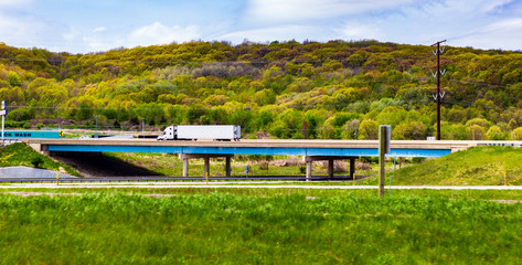 Highways and a Large Hill in Late Spring