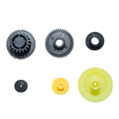 Isolated Black plastic gears and pulley set