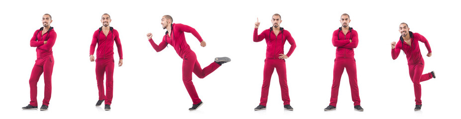 Young sportdman in red suit isolated on white